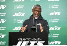 New York Jets head coach Aaron Glenn talks to the media before practice.